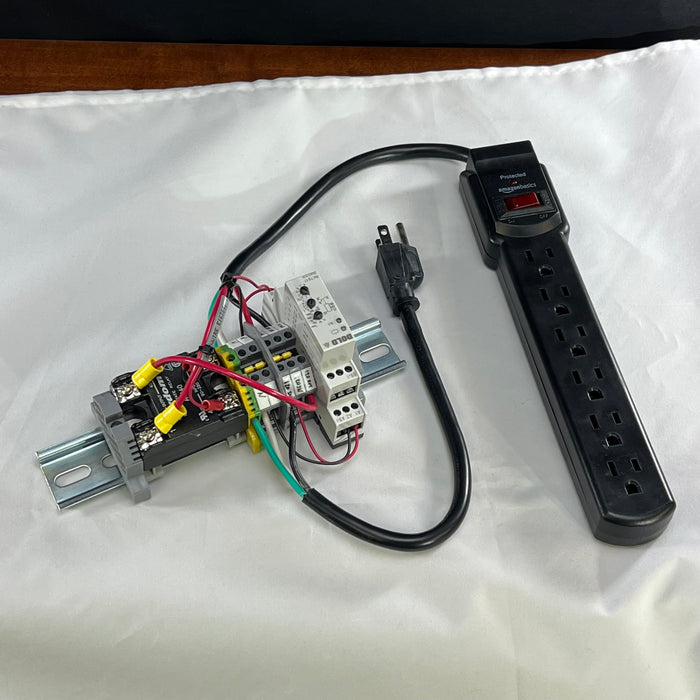 Timer circuit delays power reboot upon loss of power for industrial controls systems. This unit protects the PLC's, computers, and other critical components from repeated power cycling in a short amount of time. The unit is commonly used to replace battery backup uninterruptible power supplies.